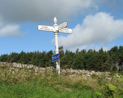 Alnham East Bridge road sign