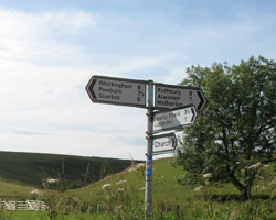 Signpost at Alnham Bridge