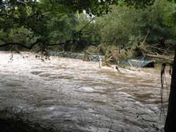 Old Butterfly Bridge lying alongside north bank of Derwent