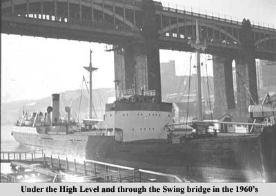 A collier passing the High Level and Swing Bridges in the 1960's
