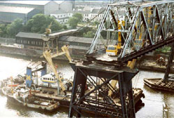 Old Redheugh bridge being dismantled. How the quayside has changed!