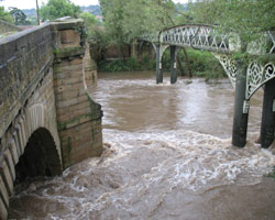 Old Swalwell Bridge and water main, 2009 flood