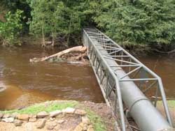 Water Main and footbridge at Shotley Bridge after flood waters September 2008