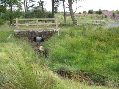 The road bridge west of Sweethope Loughs looking south