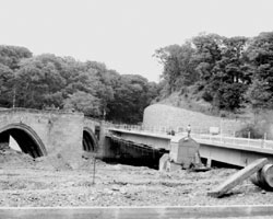 Warkworth New Bridge under construction, old bridge at left